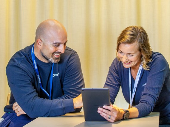 Happy employees with a tablet.jpg